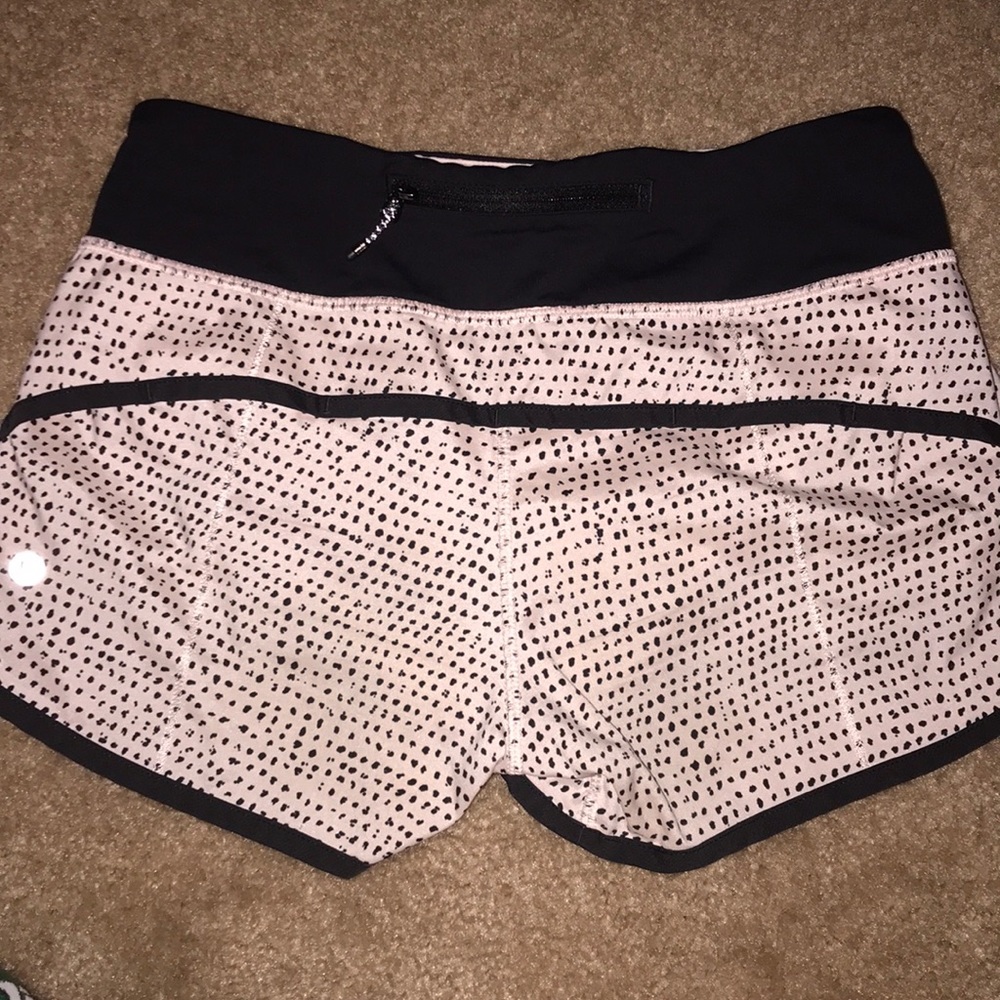 pink and black polka dot Lululemon shorts